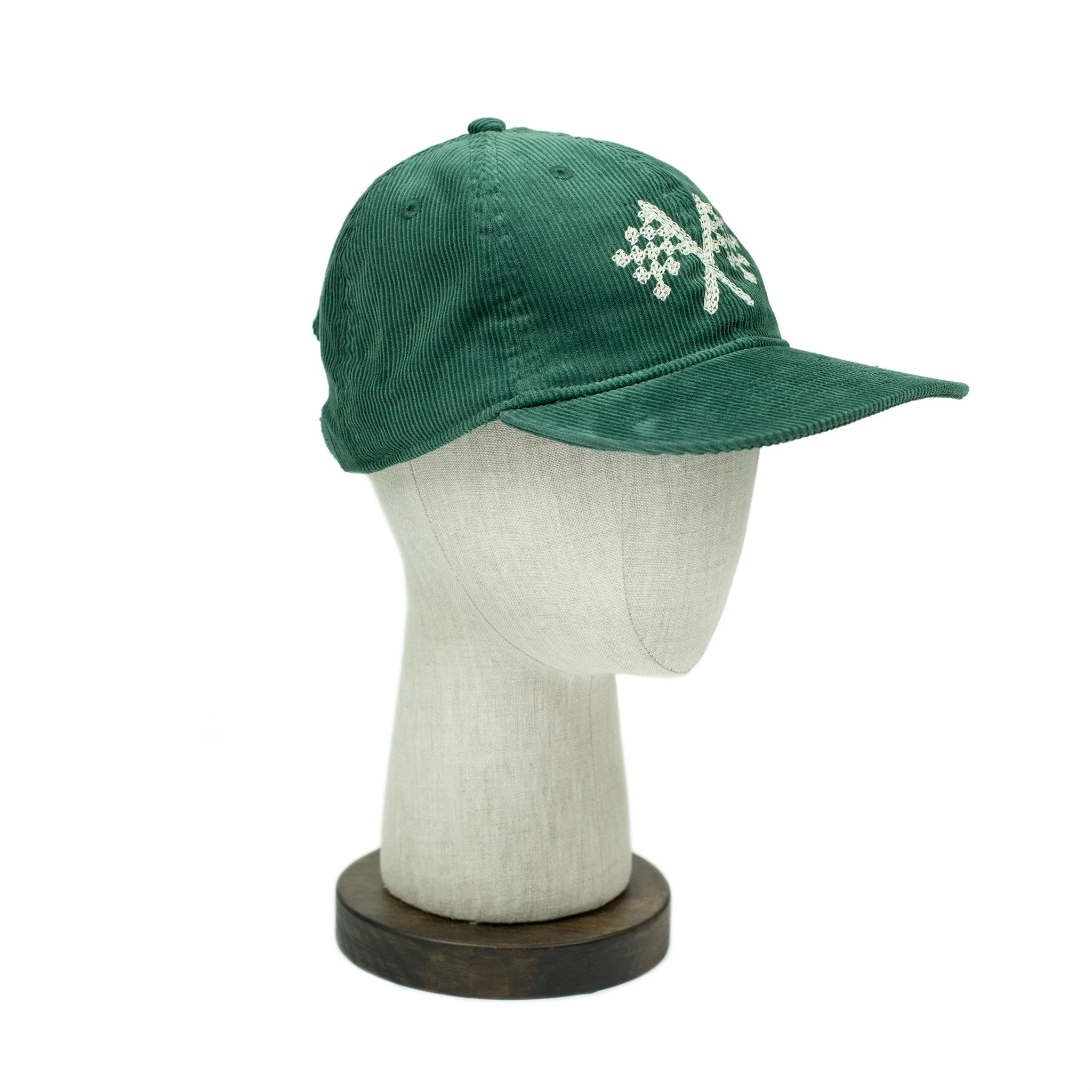 Corduroy cap in green with racing flag chainstitched embroidery